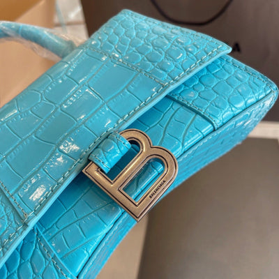 Crocodile print hourglass bag