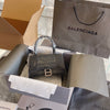 Crocodile print hourglass bag