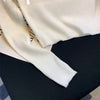 Ribbed-knit long-sleeve top