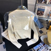 Ribbed-knit long-sleeve top
