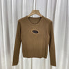 Ribbed-knit long-sleeve top