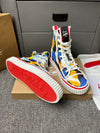 Loubouti'* latest red-soled canvas shoes