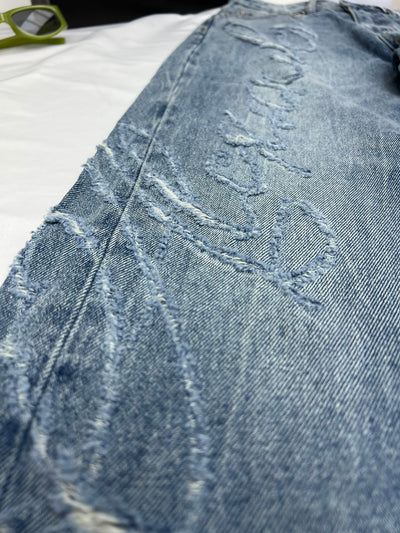 Alexander*** King scratched lettering trousers